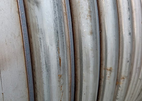 Robotic limpet coil welding — continuous fillet welds on vessel shell