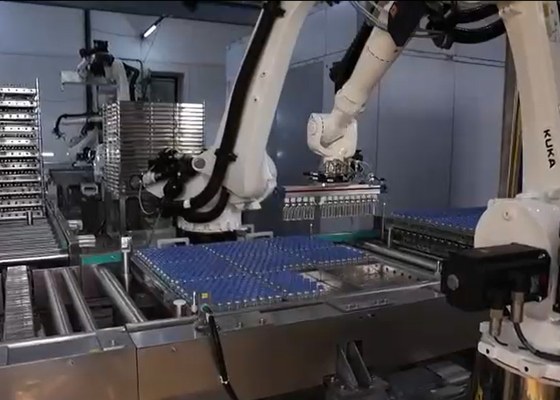 Robotic pick-and-place system for material handling and part transfer