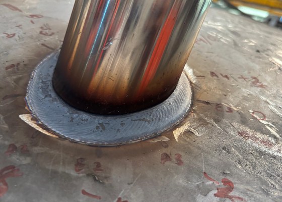 Robotic nozzle welding on pressure vessel shell with continuous fillet weld
